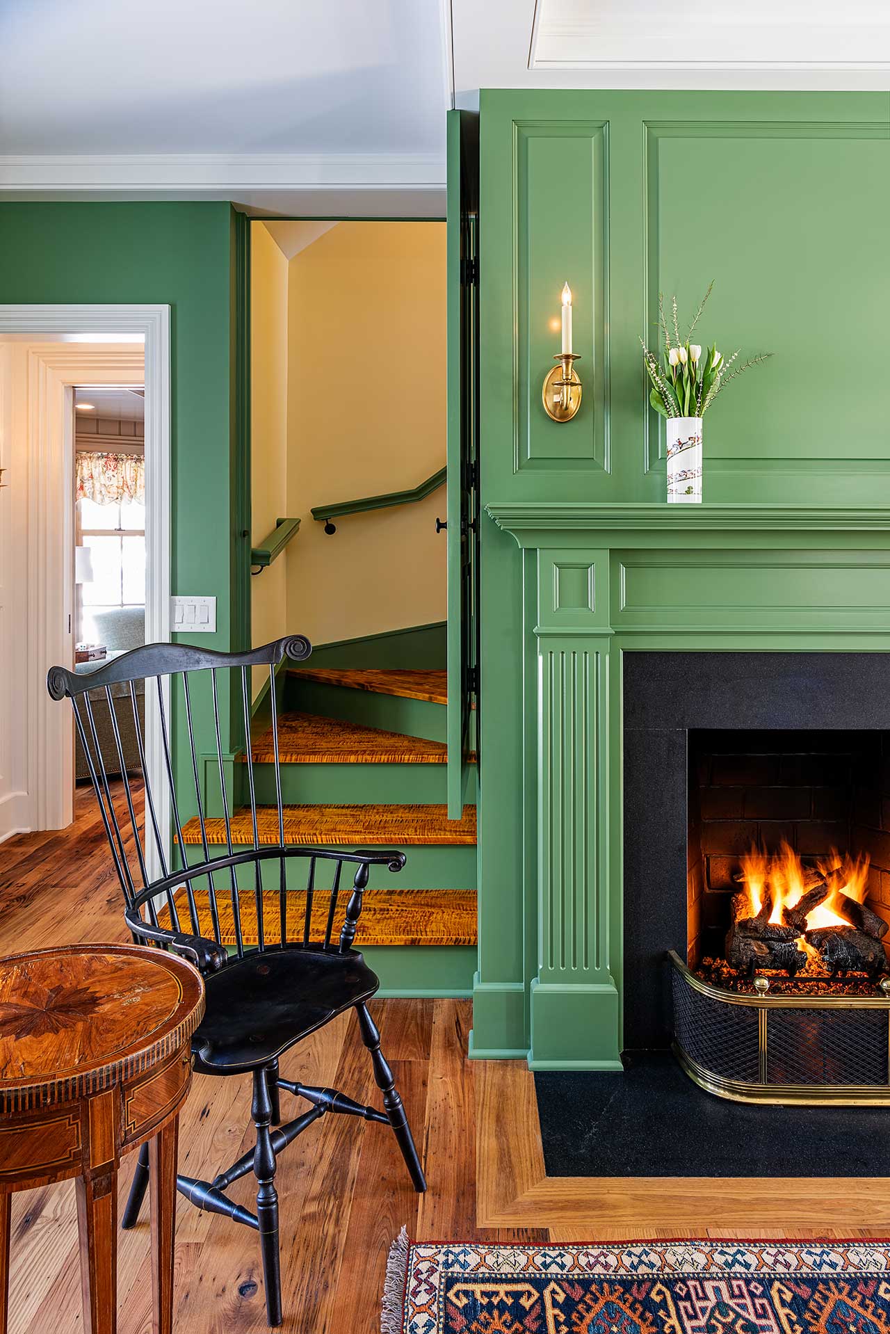 Fireplace detail and winding staircase